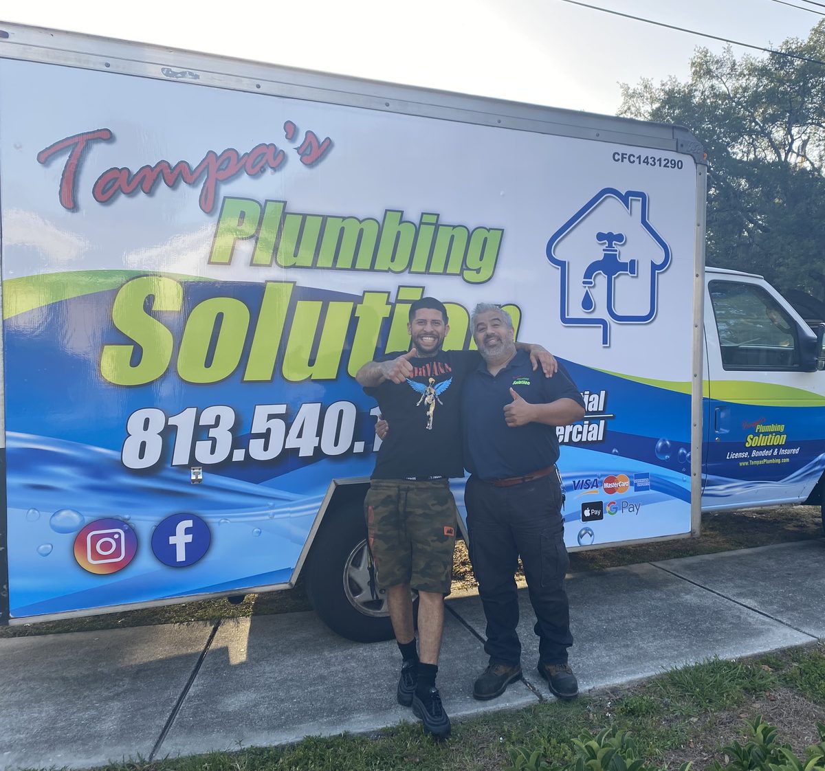 Tampa's Plumbing Solution team by branded service van